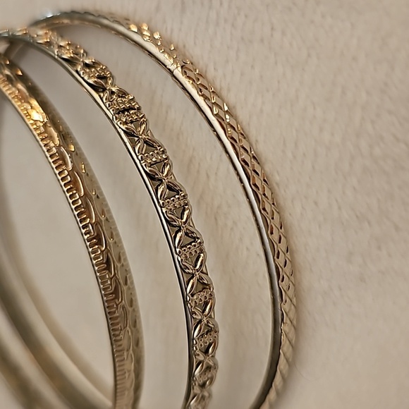 5/$25 Set of Three Textured Silvertone Bangle Bracelets - Picture 3 of 4